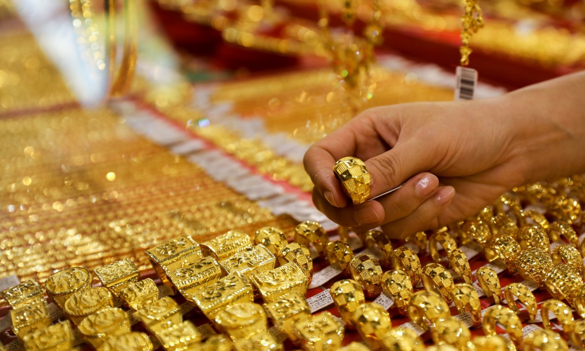 Đồng USD giảm là động lực cho vàng